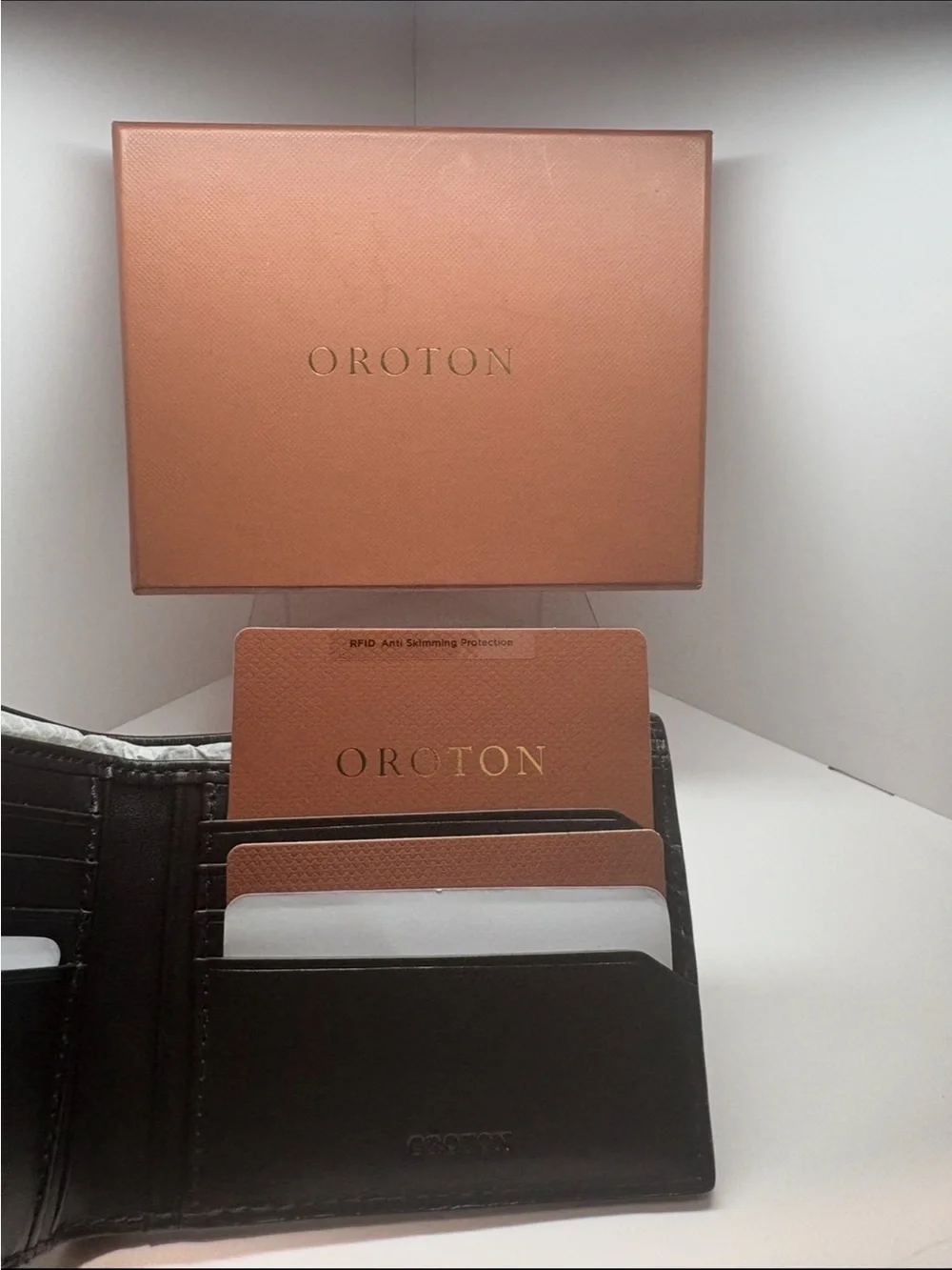 Oroton Black Embossed Circle Bifold Wallet